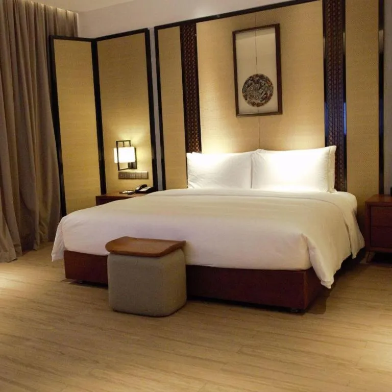 Bed in La Fountain Hotel & Resort Sanya