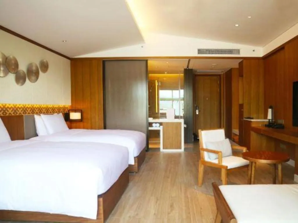 Bed in La Fountain Hotel & Resort Sanya