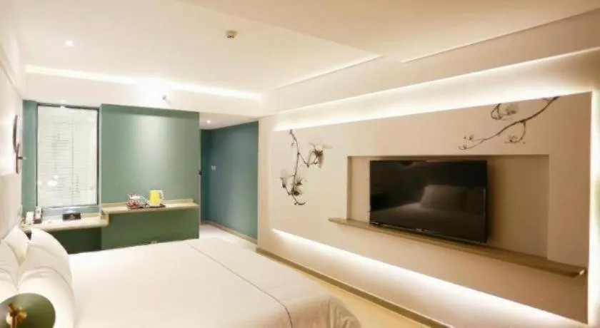 Bed in Magnotel Hotel Huizhou South Station Branch