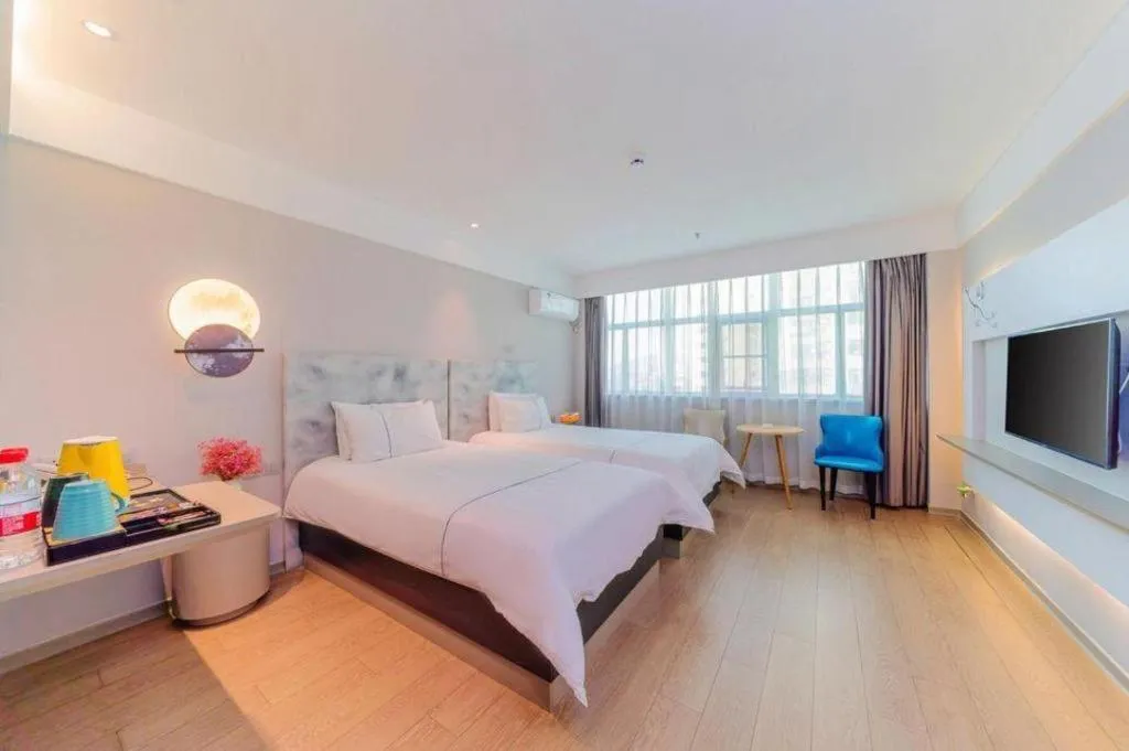 Bed in Magnotel Hotel Huizhou South Station Branch