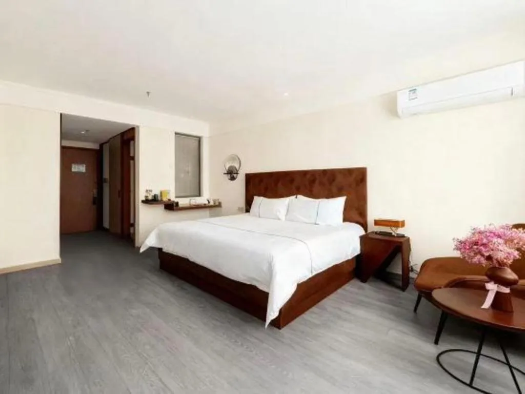 Bed in Magnotel Hotel Huizhou South Station Branch