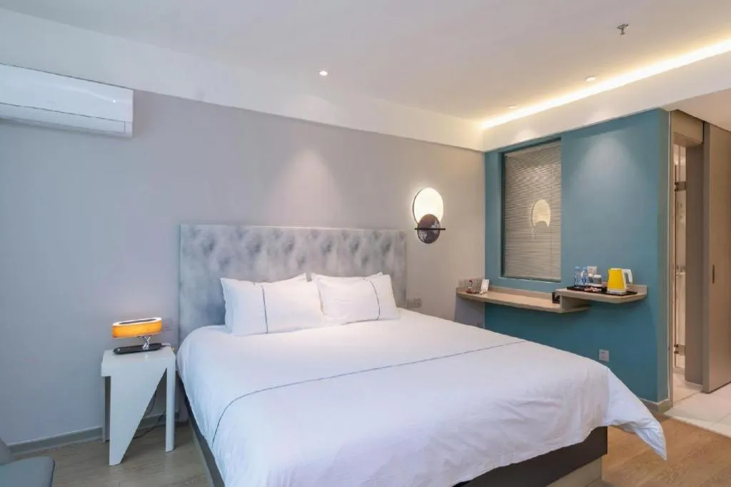 Bed in Magnotel Hotel Huizhou South Station Branch