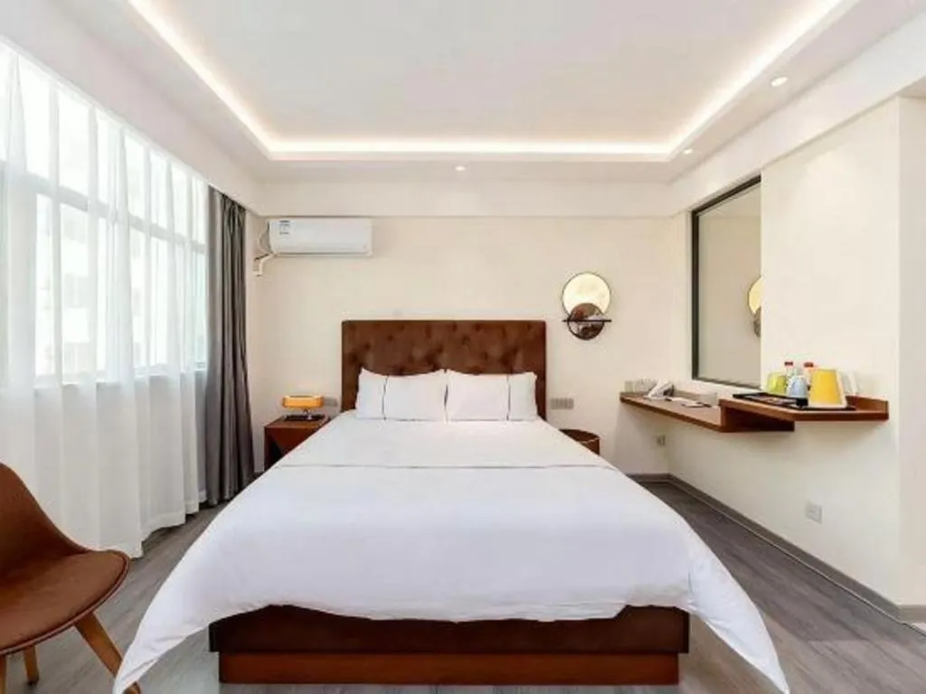 Bed in Magnotel Hotel Huizhou South Station Branch
