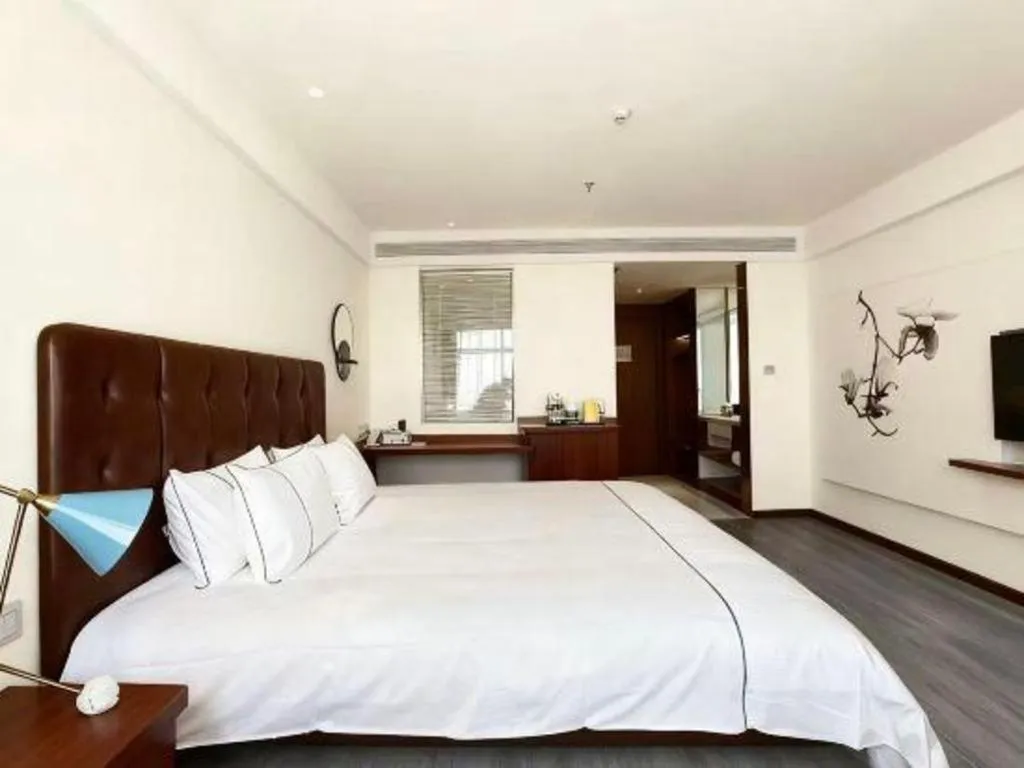 Bed in Magnotel Hotel Huizhou South Station Branch