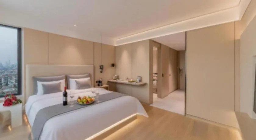 Bed in Magnotel Hotel Huizhou South Station Branch