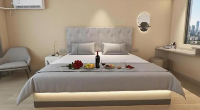 Bed in Magnotel Hotel Huizhou South Station Branch