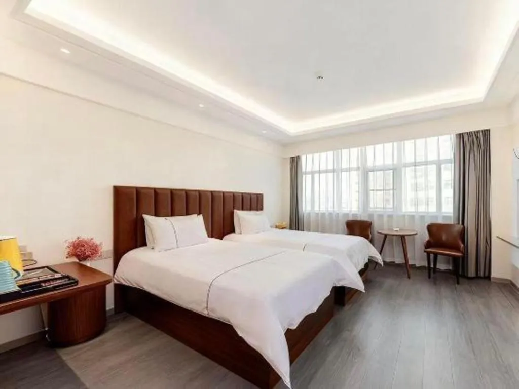 Bed in Magnotel Hotel Huizhou South Station Branch