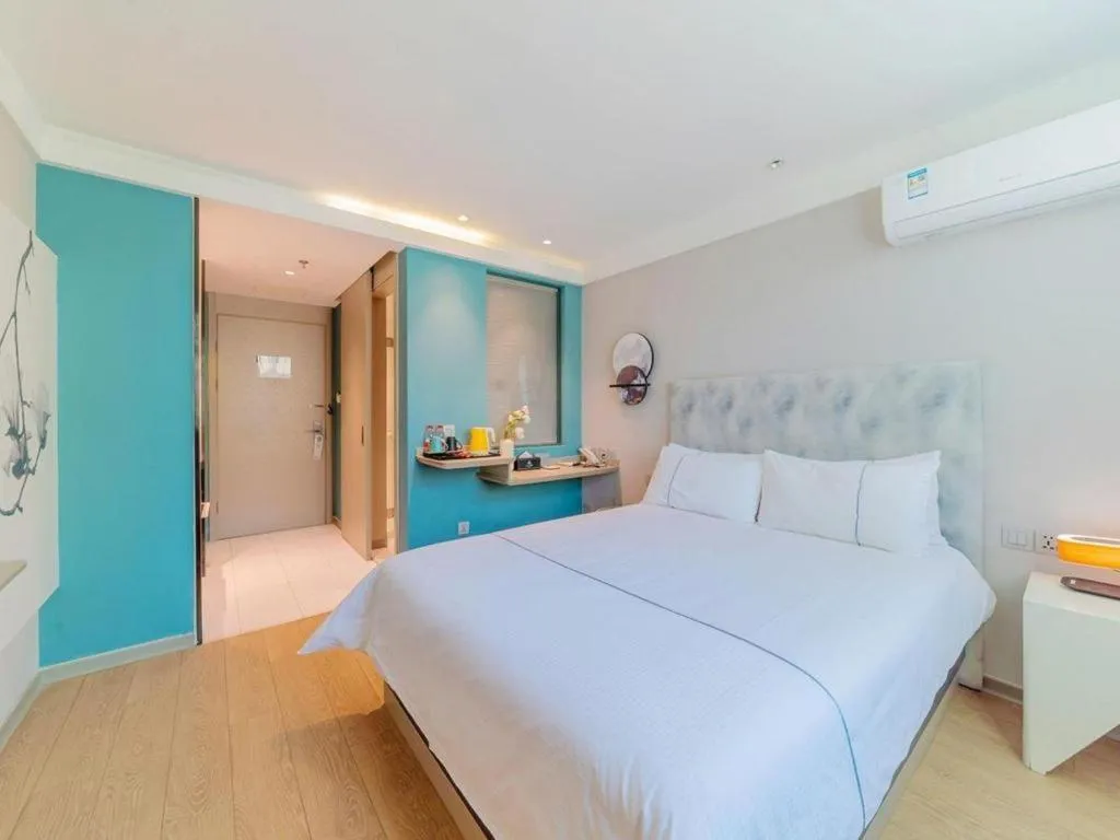 Bed in Magnotel Hotel Huizhou South Station Branch