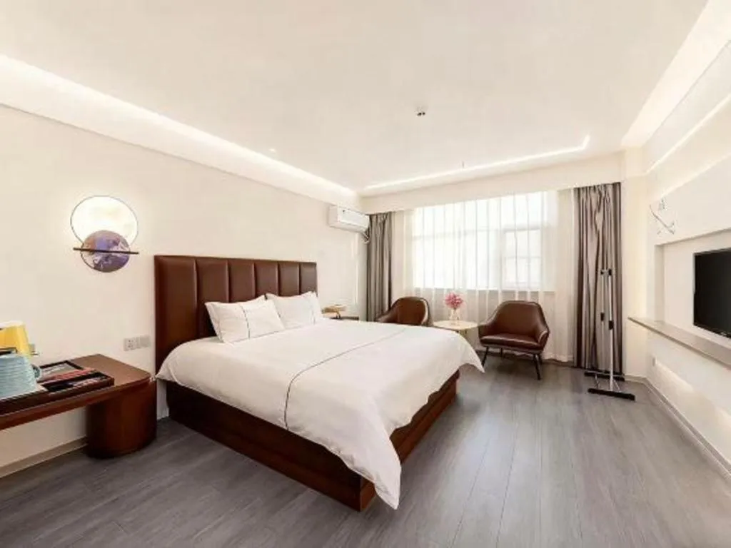 Bed in Magnotel Hotel Huizhou South Station Branch
