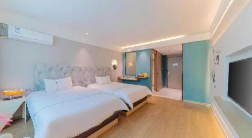 Bed in Magnotel Hotel Huizhou South Station Branch