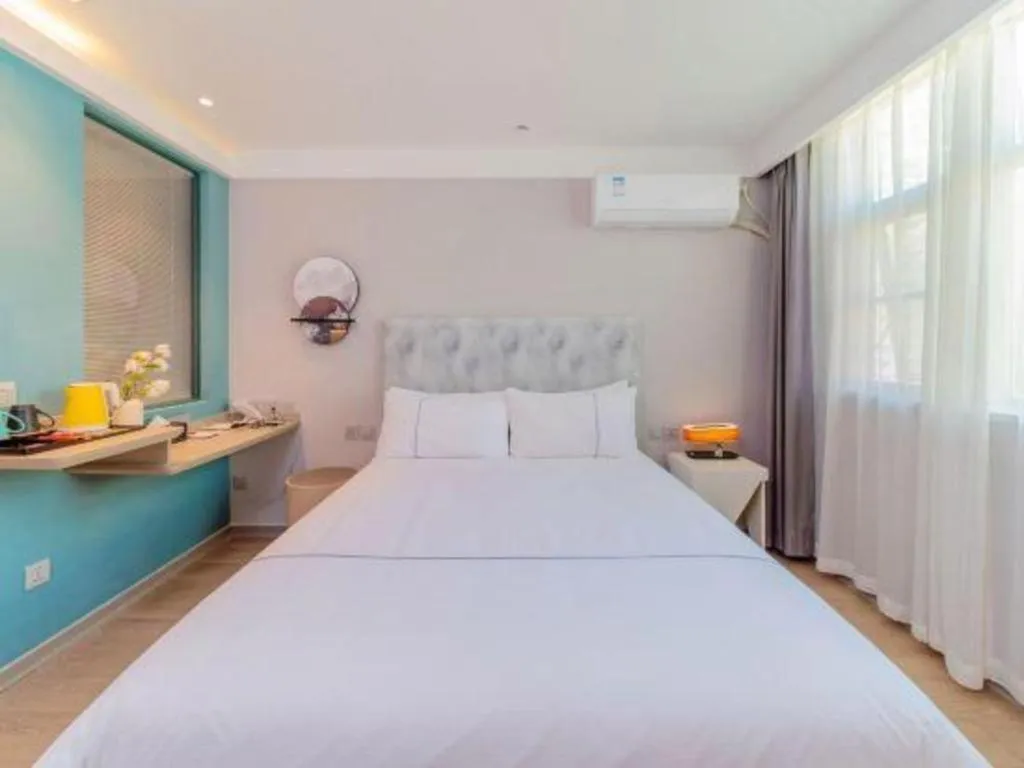 Bed in Magnotel Hotel Huizhou South Station Branch