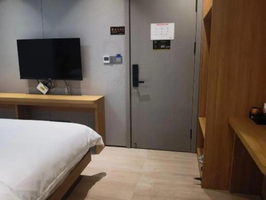 Bed in Magnotel Hotel Huizhou South Station Branch