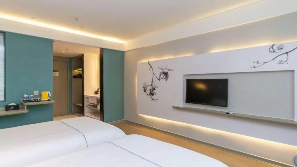 Bed in Magnotel Hotel Huizhou South Station Branch