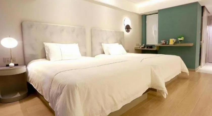 Bed in Magnotel Hotel Huizhou South Station Branch