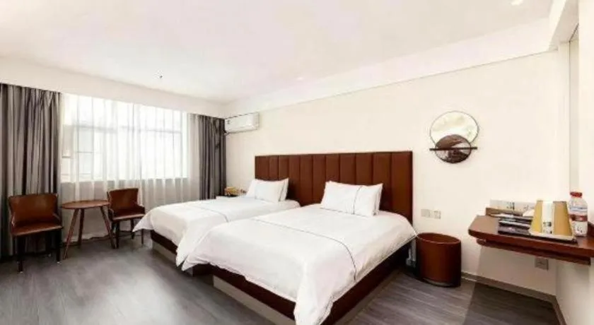 Bed in Magnotel Hotel Huizhou South Station Branch
