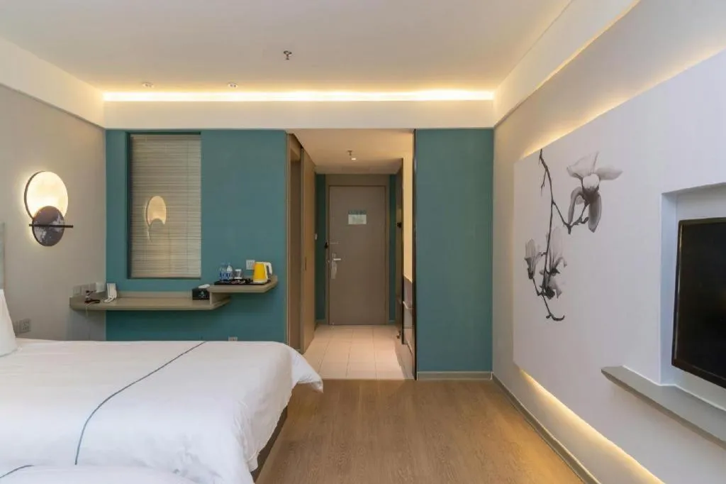 Bed in Magnotel Hotel Huizhou South Station Branch