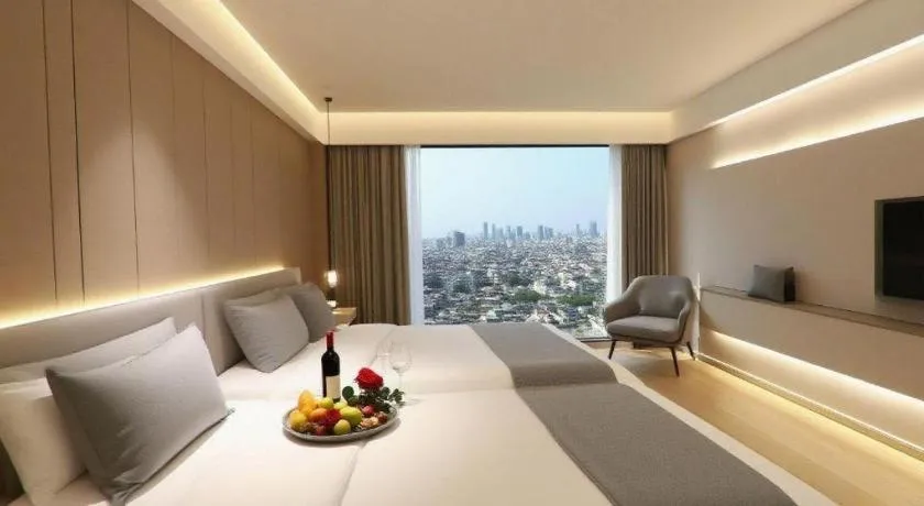 Bed in Magnotel Hotel Huizhou South Station Branch