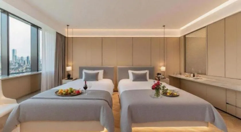 Bed in Magnotel Hotel Huizhou South Station Branch