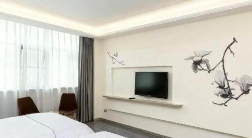 Bed in Magnotel Hotel Huizhou South Station Branch