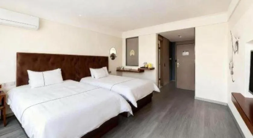 Bed in Magnotel Hotel Huizhou South Station Branch