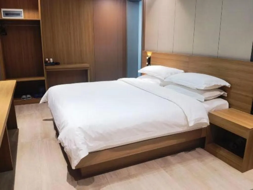 Bed in Magnotel Hotel Huizhou South Station Branch