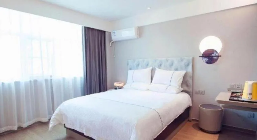 Bed in Magnotel Hotel Huizhou South Station Branch