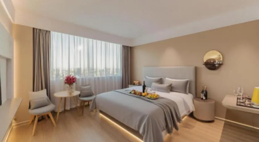 Bed in Magnotel Hotel Huizhou South Station Branch