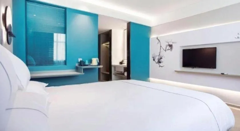 Bed in Magnotel Hotel Huizhou South Station Branch