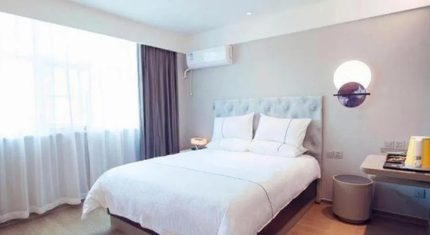 Bed in Magnotel Hotel Huizhou South Station Branch