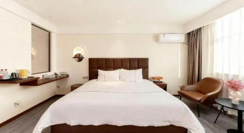 Bed in Magnotel Hotel Huizhou South Station Branch