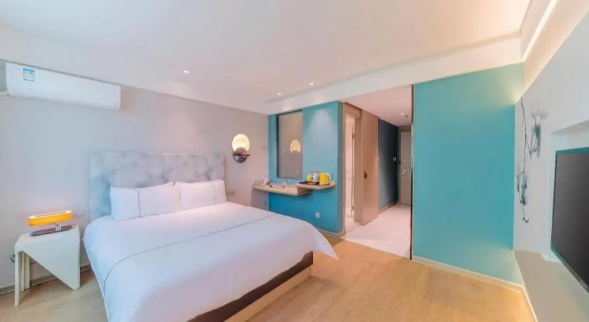 Bed in Magnotel Hotel Huizhou South Station Branch