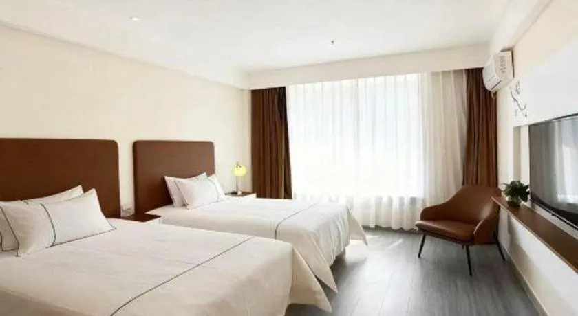 Bed in Magnotel Hotel Huizhou South Station Branch