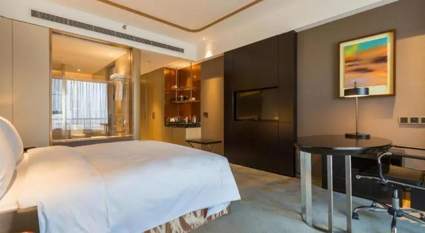 Bed in The QUBE Hotel Jingzhou