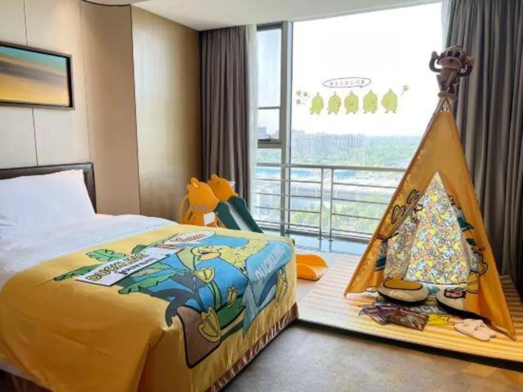 Bed in The QUBE Hotel Jingzhou