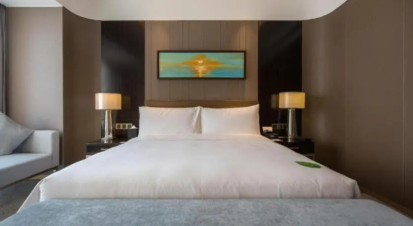 Bed in The QUBE Hotel Jingzhou