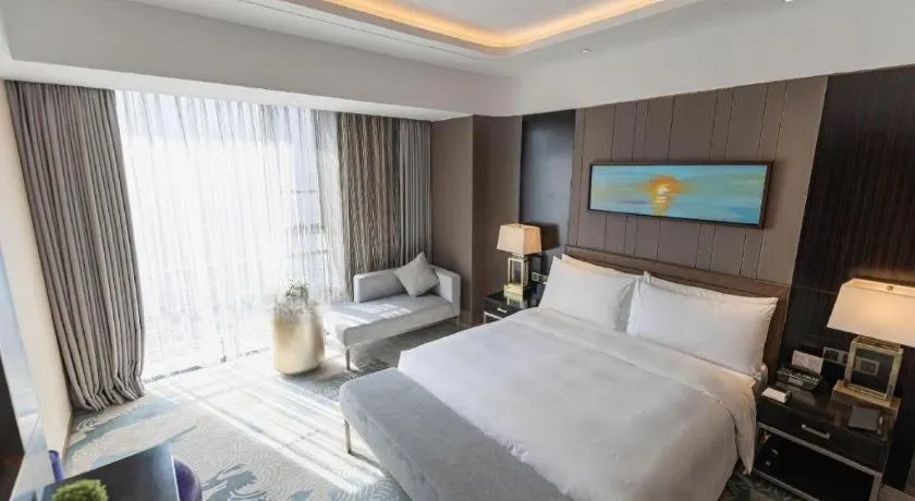 Bed in The QUBE Hotel Jingzhou