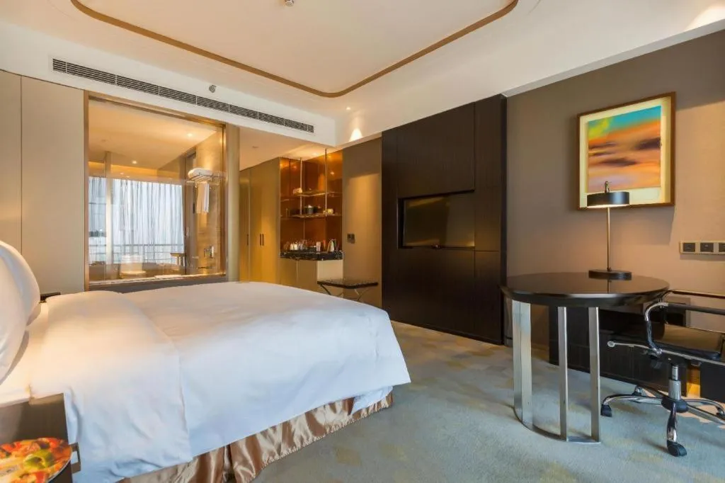 Bed in The QUBE Hotel Jingzhou