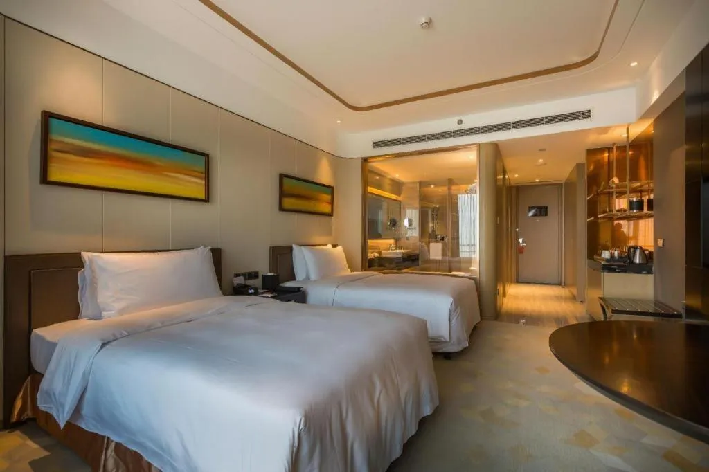 Bed in The QUBE Hotel Jingzhou