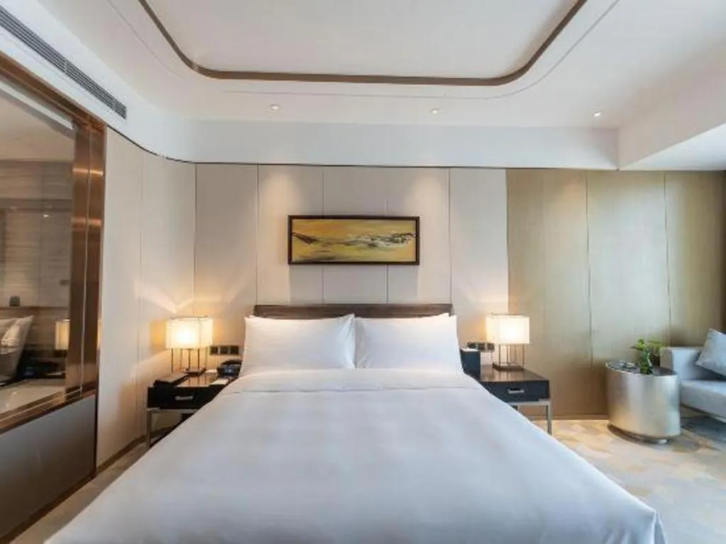 Bed in The QUBE Hotel Jingzhou