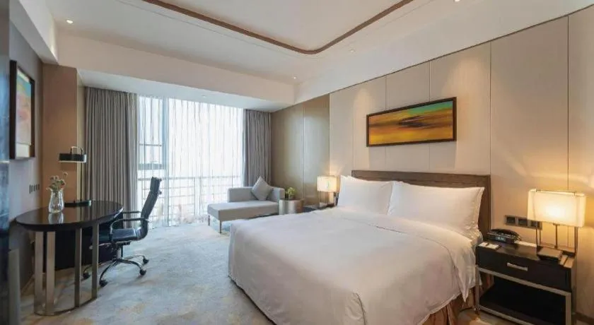 Bed in The QUBE Hotel Jingzhou