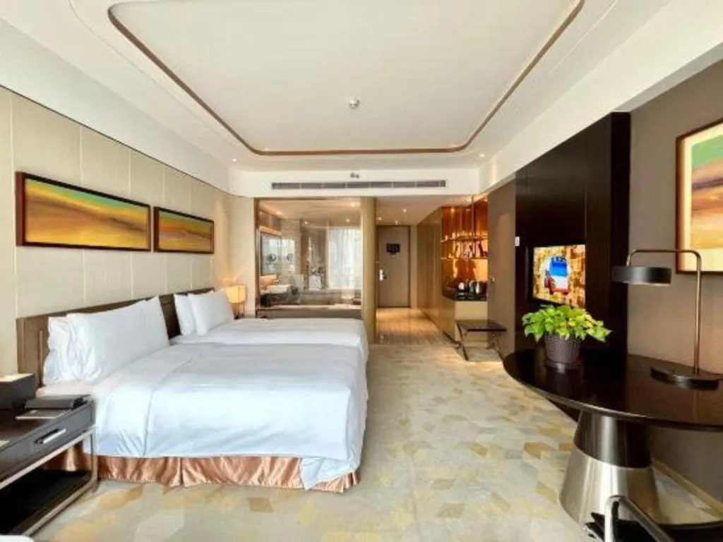 Bed in The QUBE Hotel Jingzhou
