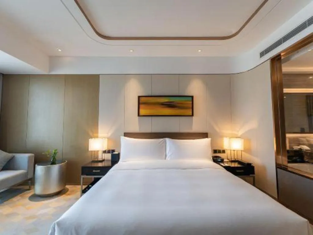 Bed in The QUBE Hotel Jingzhou