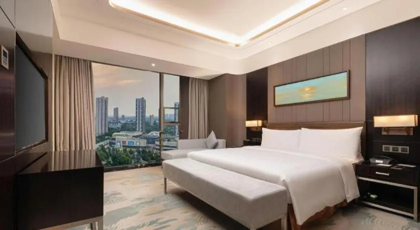 Bed in The QUBE Hotel Jingzhou