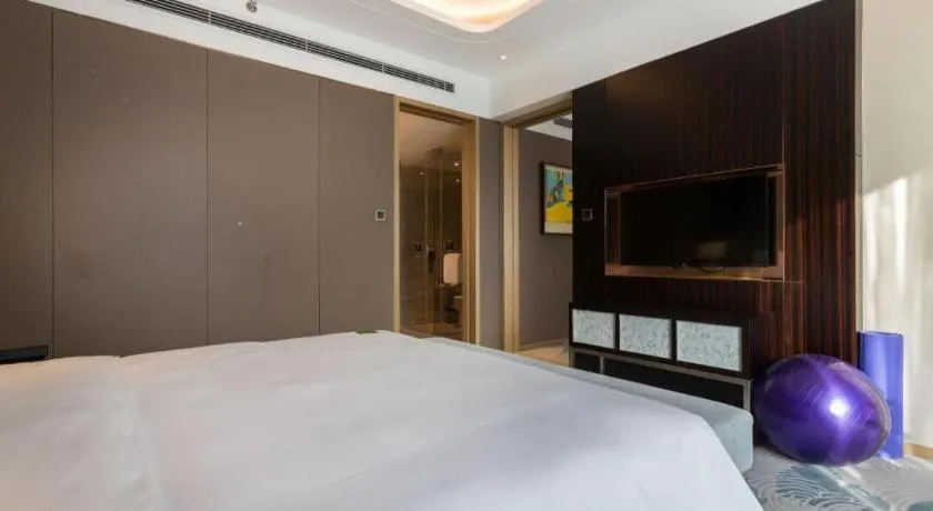 Bed in The QUBE Hotel Jingzhou
