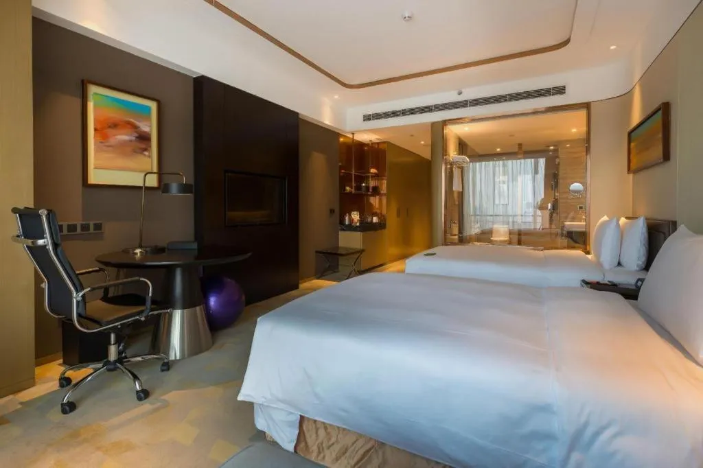 Bed in The QUBE Hotel Jingzhou