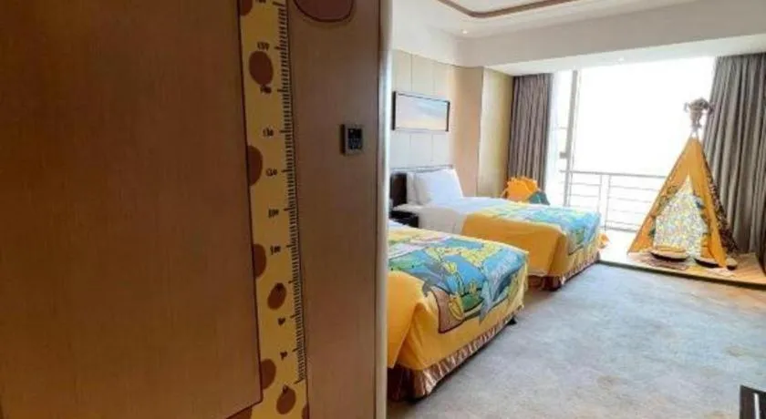 Bed in The QUBE Hotel Jingzhou
