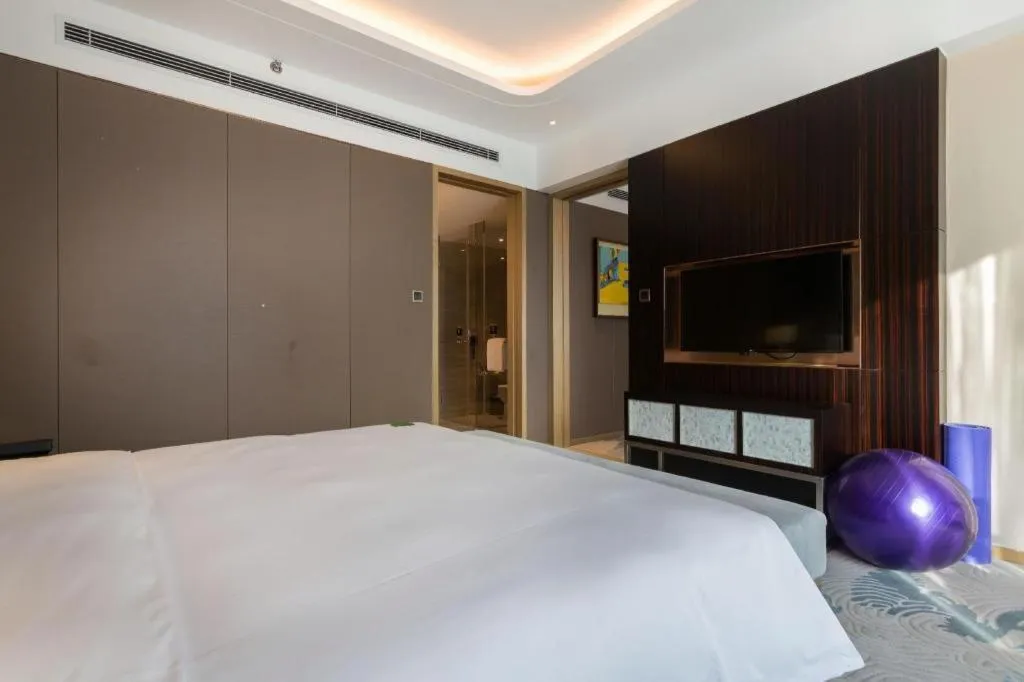 Bed in The QUBE Hotel Jingzhou