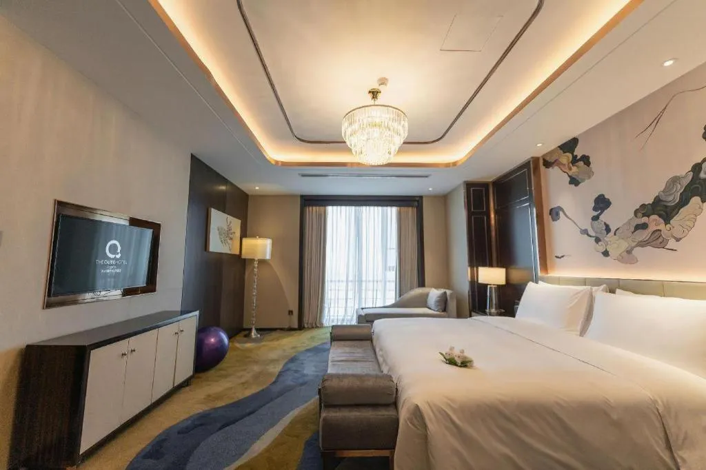 Bed in The QUBE Hotel Jingzhou