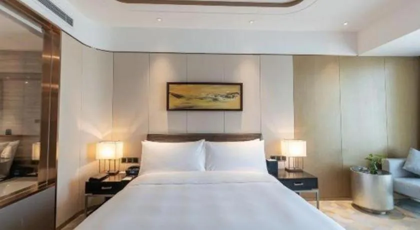 Bed in The QUBE Hotel Jingzhou