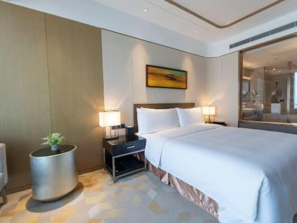 Bed in The QUBE Hotel Jingzhou